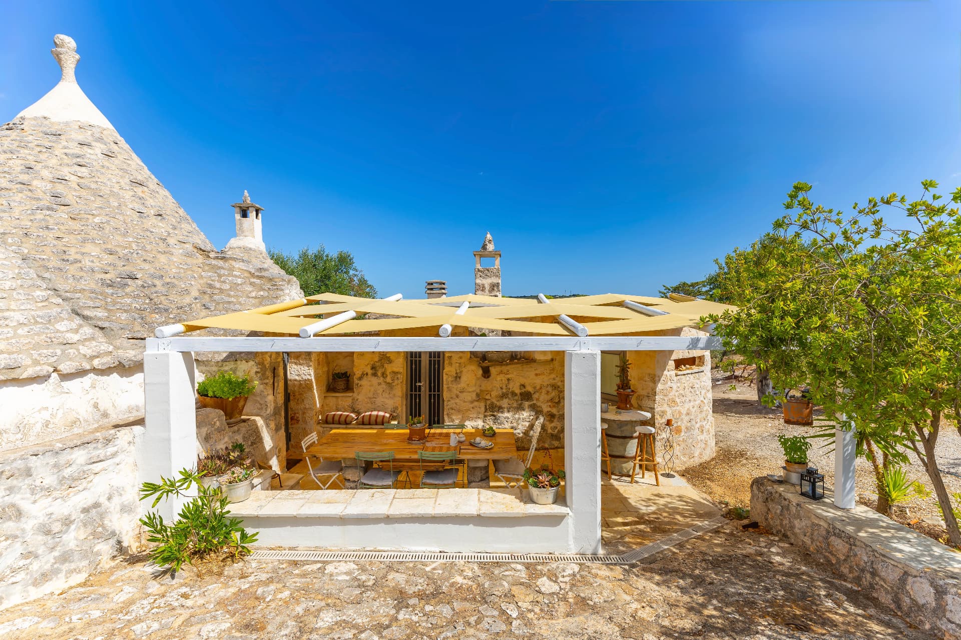 Breakfast in the trullo courtyard