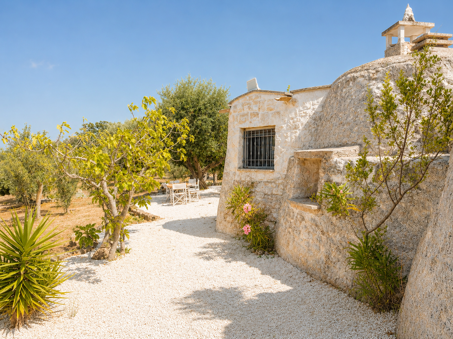 Breakfast in the trullo courtyard