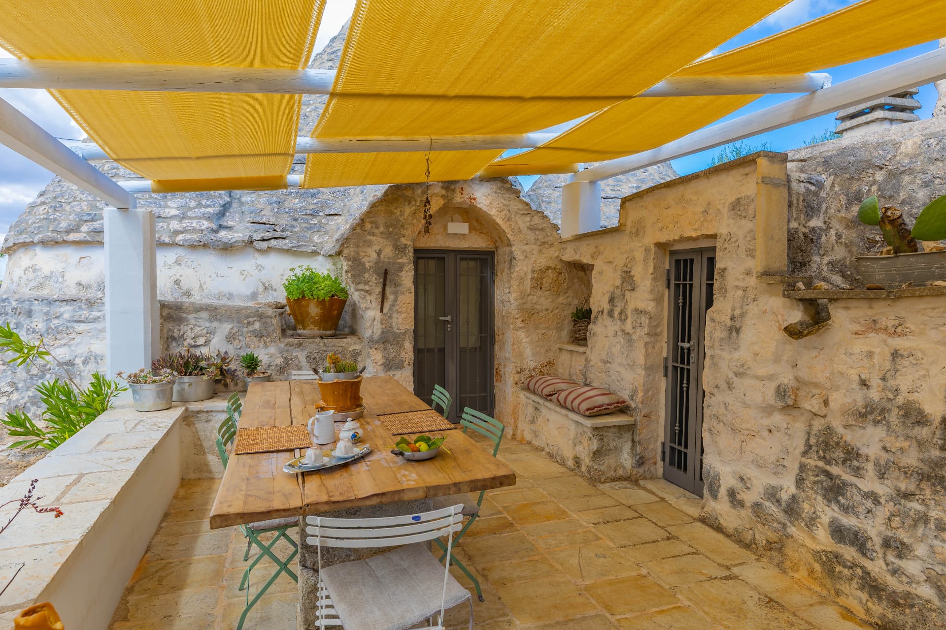 Breakfast in the trullo courtyard
